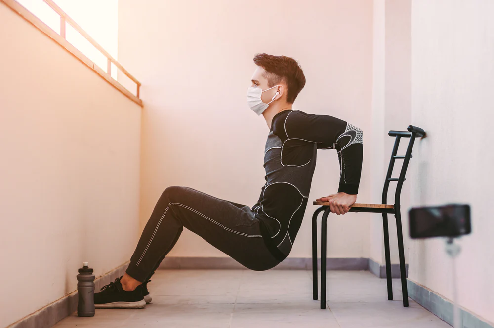 man working out with chain