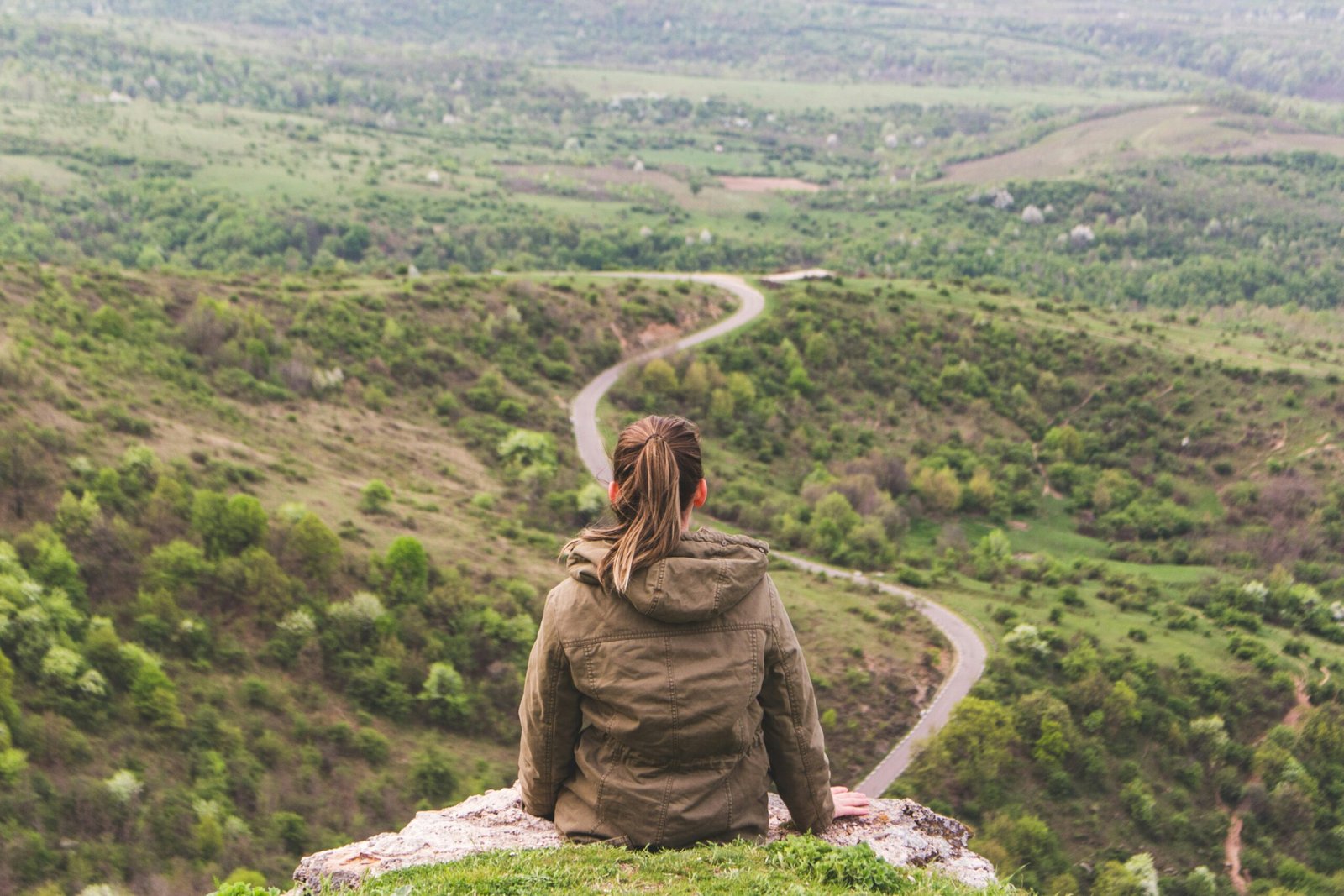 woman relaxing on a hill